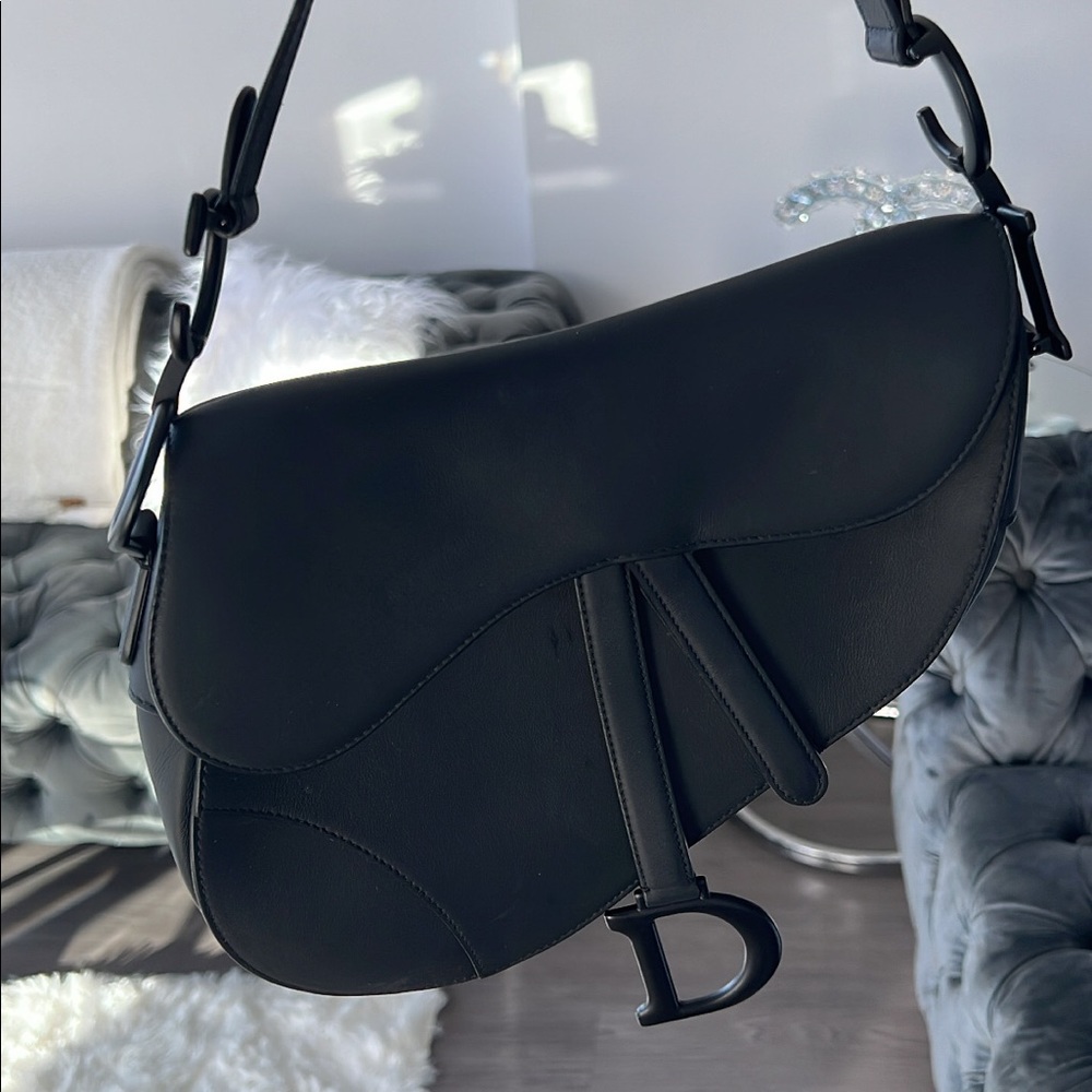 Christian Dior Saddle Bag. Still have the receipts